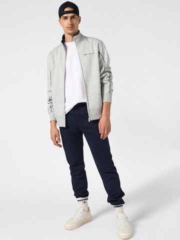 Champion Authentic Athletic Apparel Sweatsuit in Blue: front