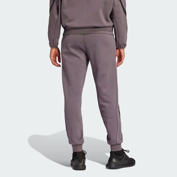 Tapered Pantaloni sportivi 'Z.N.E.' di ADIDAS SPORTSWEAR in grigio