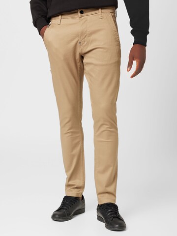 Skinny Pantalon chino G-Star RAW en beige : devant