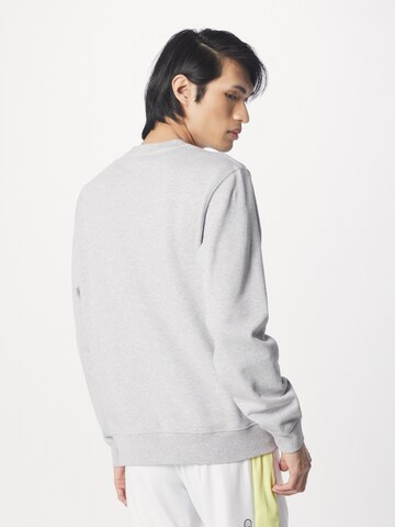 LACOSTE - Sudadera en gris