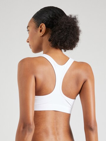 Bustino Reggiseno sportivo 'Swoosh' di NIKE in bianco