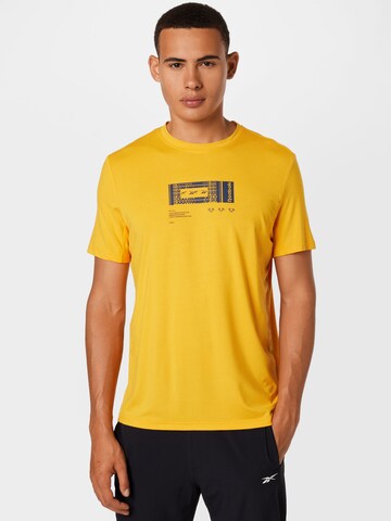 Reebok - Camisa funcionais em amarelo: frente