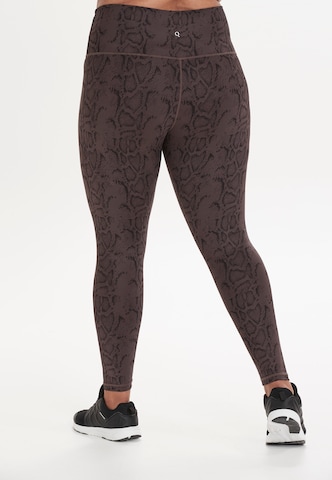 Q by Endurance Skinny Sportbroek 'Cerine' in Lila: voorkant