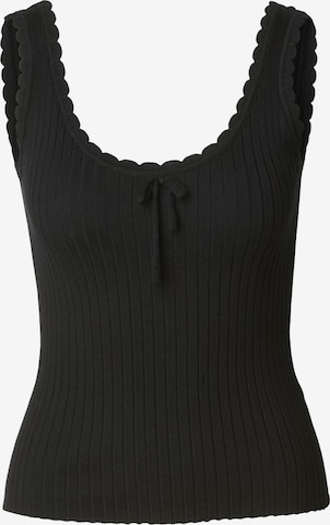 Top in maglia di Estelou in nero: frontale