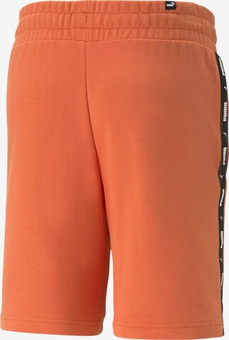 PUMA Regular Workout Pants in Orange