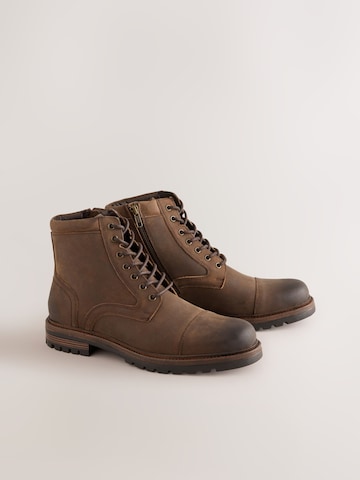 Next - Botas con cordones en marrón