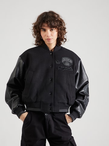 ADIDAS ORIGINALS - Chaqueta de entretiempo en negro: frente