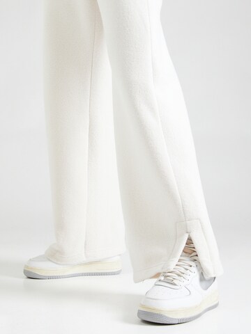 Nike Sportswear Wide leg Trousers 'PHNX' in Beige