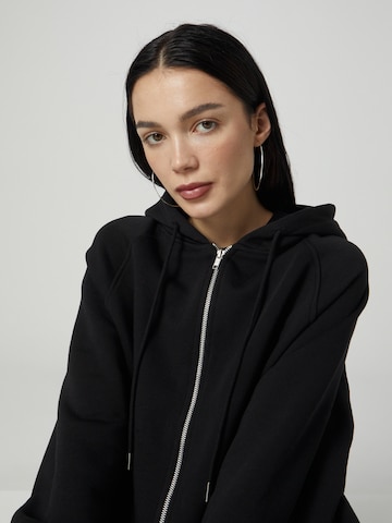 ABOUT YOU x Chiara Biasi Zip-Up Hoodie 'Ilse' in Black