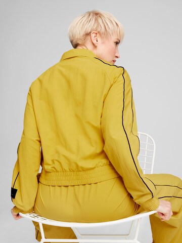 PUMA Between-Season Jacket 'PLAY LOUD T7' in Yellow