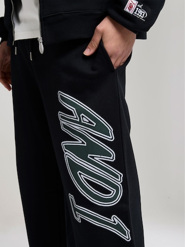 AND1 Конический (Tapered) Штаны 'Staple Graphic' в Черный
