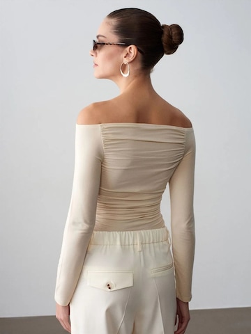 Maglietta di Dilvin in beige