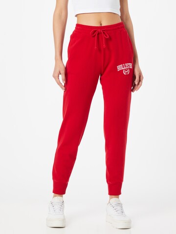 HOLLISTER Tapered Trousers in Red: front