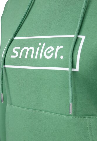 smiler. Kapuzensweatshirt Happy. in Grün