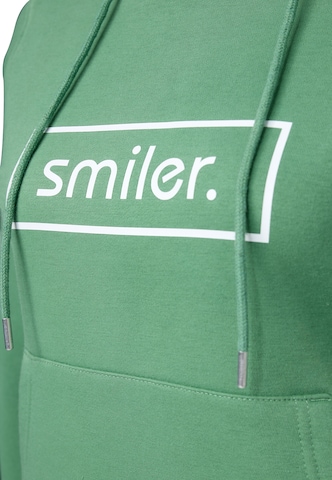Sweat-shirt smiler. en vert