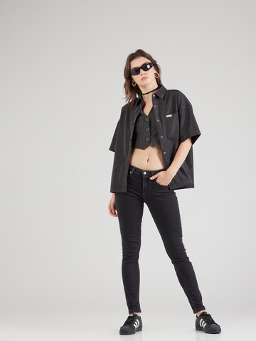 Calvin Klein Jeans Kitsas Teksapüksid 'MID RISE SKINNY', värv must