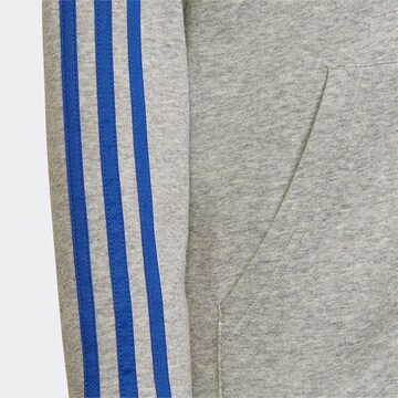 ADIDAS SPORTSWEAR Αθλητική ζακέτα φούτερ 'Essentials 3-Stripes' σε γκρι