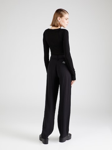 Calvin Klein Jeans Tapered Pleat-front trousers in Black