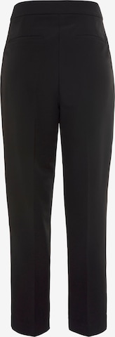 LASCANA - regular Pantalón de pinzas en negro