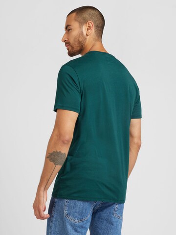 GUESS T-Shirt 'CLASSIC' in Grün