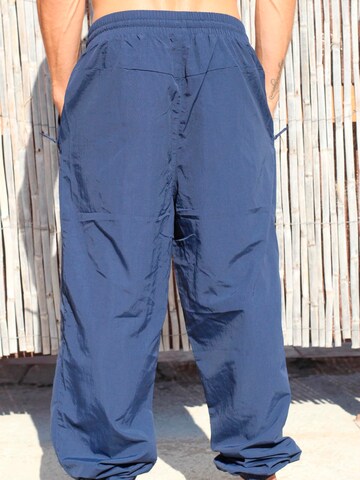 Surf Monkey - Loosefit Pantalón funcional en azul