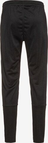 Coupe slim Pantalon de sport JAKO en noir