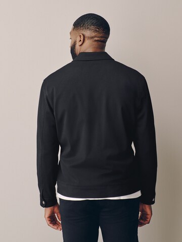 Next Between-Season Jacket 'Motionflex' in Black