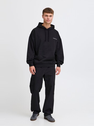 Pull-over ' JCMMSANDER HOODIE SWEAT' The Jogg Concept en noir