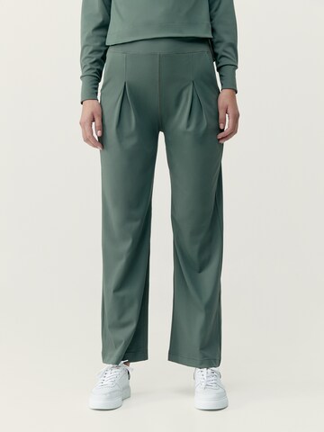 évasé Pantalon de sport 'Audrey' Born Living Yoga en vert : devant