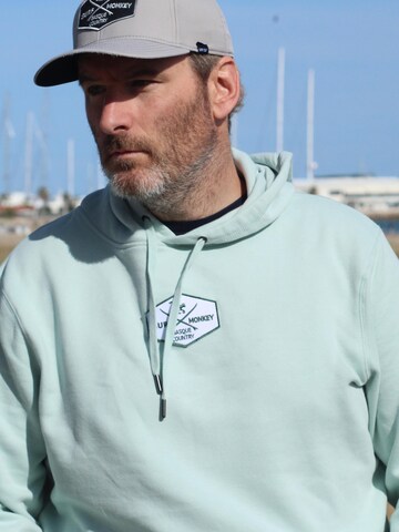Surf Monkey Sweatshirt‌‌‌‌‌‌‌ in Grün