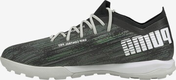 PUMA Soccer Cleats in Black: front