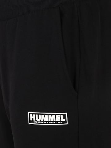 Tapered Pantaloni sportivi 'LEGACY' di Hummel in nero