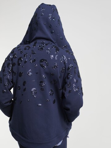Lola Casademunt - Sudadera con cremallera en azul