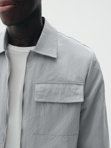 Sinned x ABOUT YOU Between-Season Jacket 'Leo' in Grey