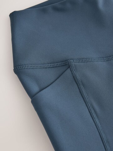 évasé Pantalon de sport self. en bleu