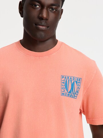 Tricou 'Finn Paradise Block' de la Shiwi pe portocaliu