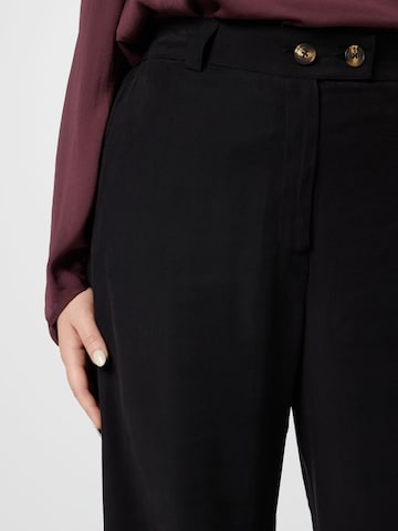 Wide leg Pantaloni di ONLY Carmakoma in nero