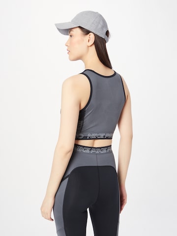 NIKE Sportovní top – černá