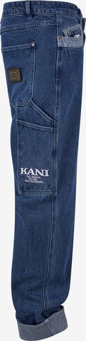 Tapered Jeans con pieghe di Karl Kani in blu