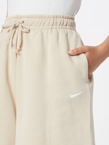 Nike Sportswear Wide leg Παντελόνι σε μπεζ