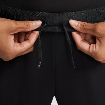 Coupe slim Pantalon de sport 'Strike' NIKE en noir