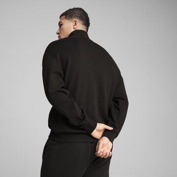 PUMA Sweatshirt 'Wardrobe Ess' in Zwart