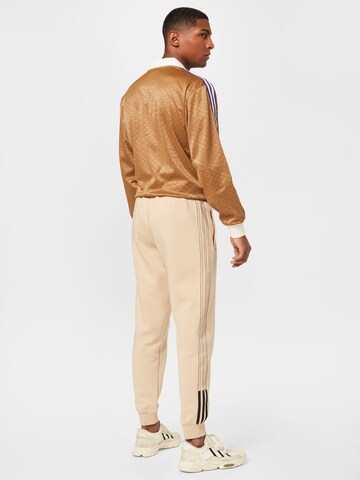 ADIDAS ORIGINALS Tapered Trousers 'Fleece Sst' in Beige