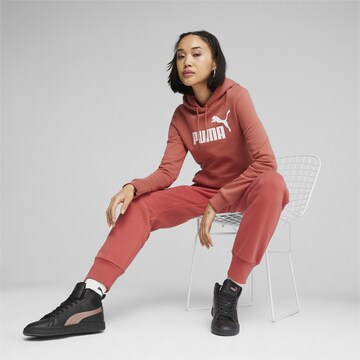 Tapered Pantaloni sportivi 'Essentials' di PUMA in rosso