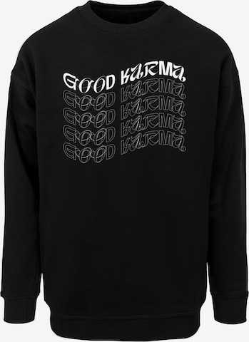 Merchcode Sweatshirt 'Good Karma' in Black: front