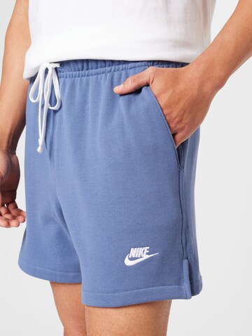 Regular Pantaloni 'Club' de la Nike Sportswear pe albastru