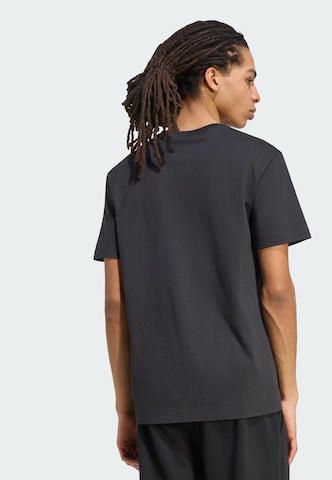 ADIDAS SPORTSWEAR - Camiseta funcional en negro