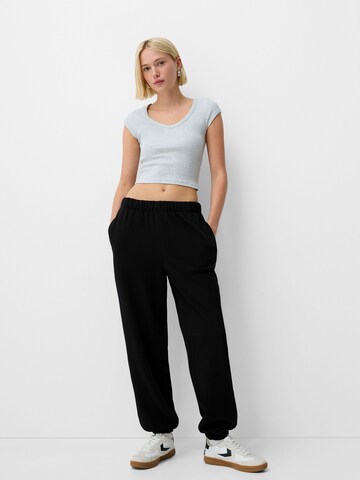 Tapered Pantaloni di Bershka in nero