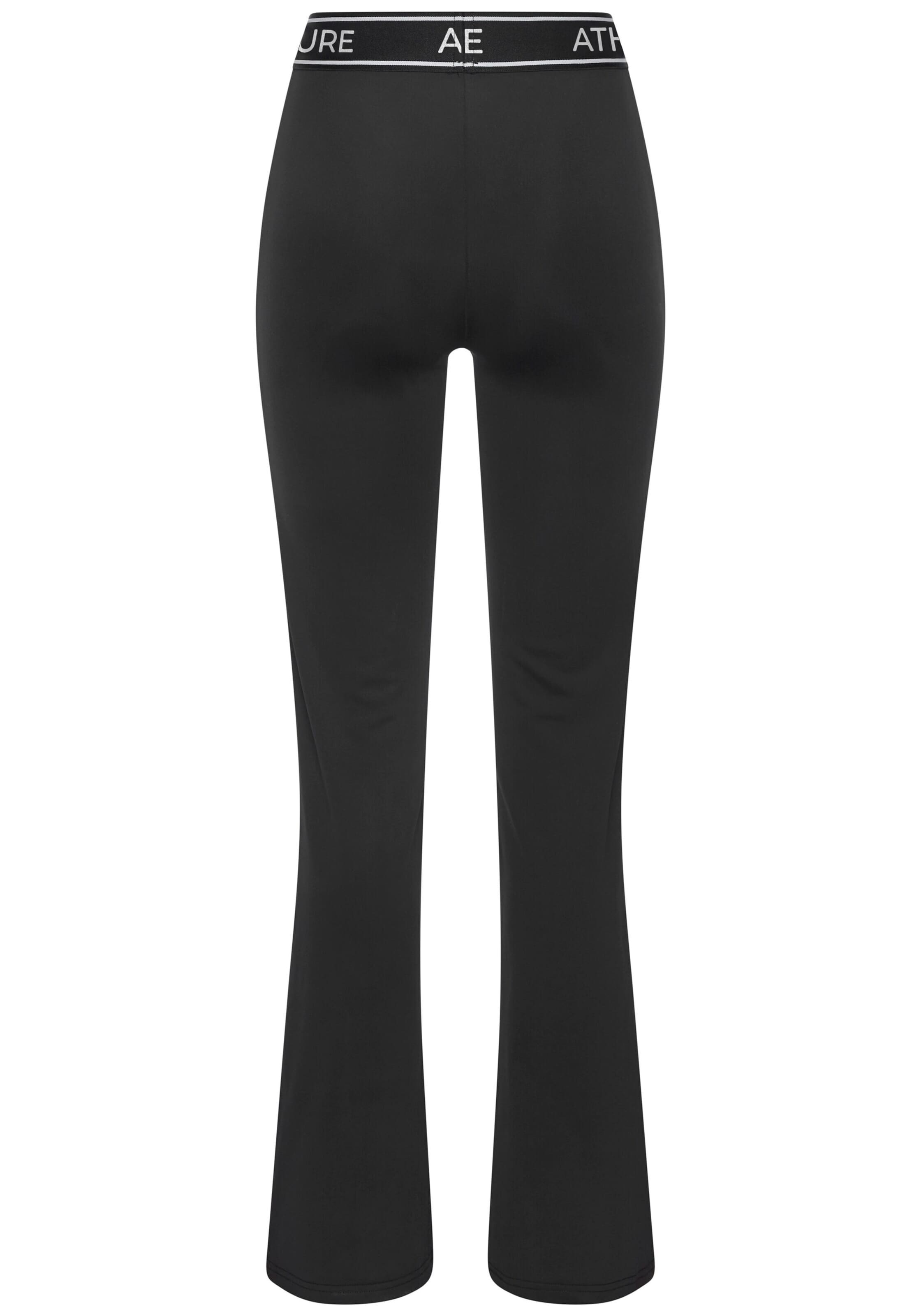 LASCANA ACTIVE - Acampanado Pantalón deportivo en negro