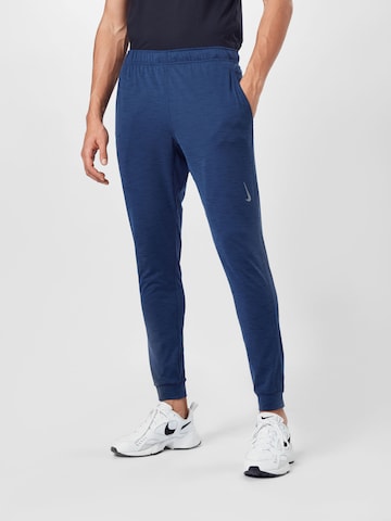 NIKE Zúžený Sportovní kalhoty – modrá: přední strana